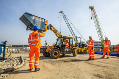 An electric digger being demonstrated on site at HS2's Victoria Road.