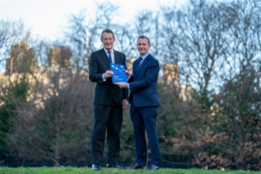 ICS chairman Ian Russell (left) presents Michael Matheson, Scottish cabinet secretary for transport and infrastructure, with the ICS report.