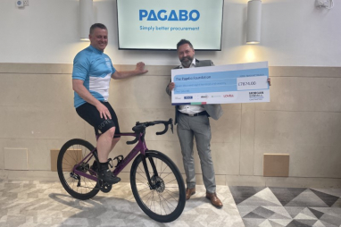 Morgan Sindall framework manager Rob Hall, left, hands a cheque for £7,874 to Pagabo Foundation trustee Jason Stapley.