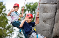 Local scouts enjoying the new climbing facilities at PACCAR scouts camp in Buckinghamshire.