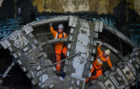 HS2 tunnellers operating Atlas Road Logistics Tunnel TBM Lydia celebrate breaking through into the Old Oak Common box