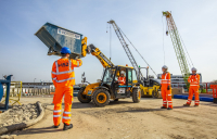 An electric digger being demonstrated on site at HS2's Victoria Road.