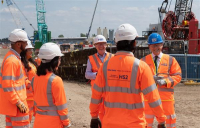 Transport secretary Grant Shapps and HS2 CEO Mark Thurston meet apprentices working on the construction of HS2's Old Oak Common station.