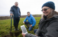 Heathrow director of sustainability Matt Gorman (left), Agricarbon co-founder Stewart Arbuckle, and Helaina Black, senior soil scientist & honorary associate of the James Hutton Institute, at a Dundee carbon farming project supported by Heathrow.