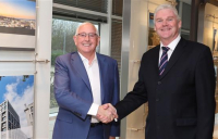 Ray O'Rourke, left, welcomes CEO designate Seamus French to Laing O'Rourke.