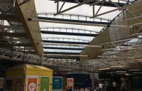 Leeds station new roof lets passengers see the light.