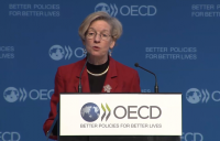 OECD chief economist Catherine Mann delivering the organisation's interim economic outlook. 