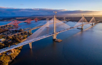 The new Queensferry Crossing with the old Forth Road Bridge and the Forth Rail Bridge in the background.