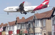 Aircraft over houses